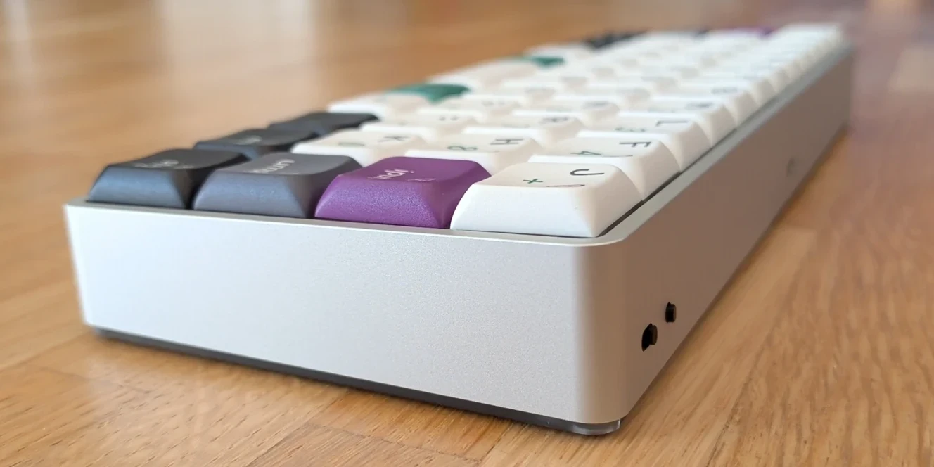12x4 ortholinear keyboard with the Firmlynoted layout. Shown from a back-right angle.